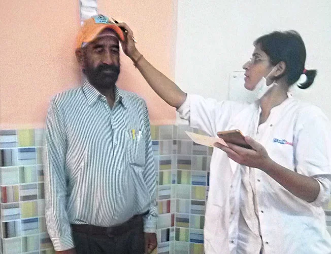 112 participants take various medical tests at a health camp by YouWeCan Foundation